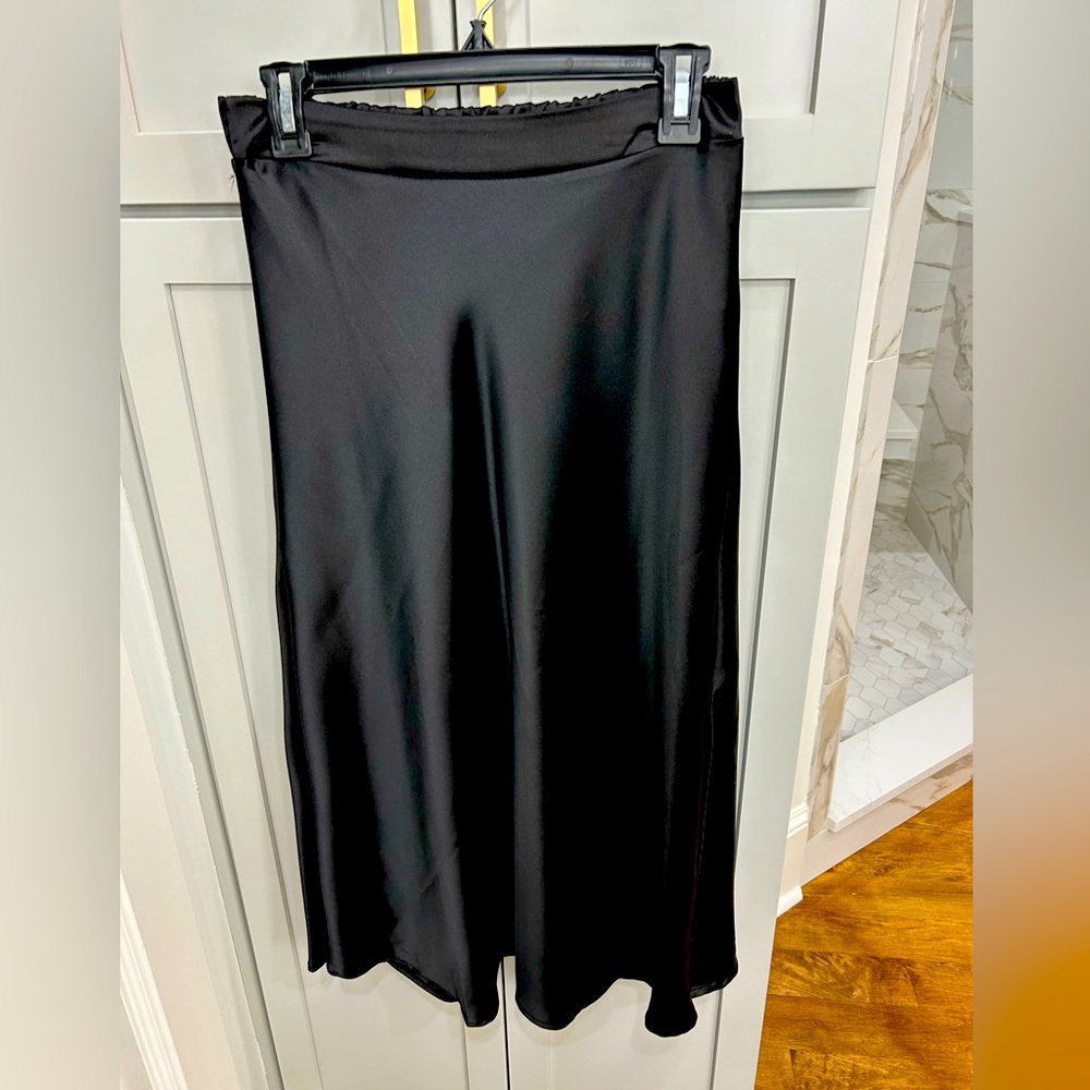 Black satin midi skirt